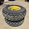 Pair of 16.9 24 turf tires on Jd 8 bolt wheels