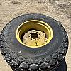 Pair of 16.9 24 turf tires on Jd 8 bolt wheels