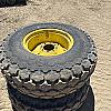 Pair of 16.9 24 turf tires on Jd 8 bolt wheels