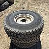 Pair of 44x18.00-20 turf tires on Newholland 8 bolt wheels