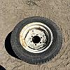 Pair of 27x10:50-15 turf tires on Newholland 6 bolt wheels