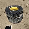 Pair of 300/70R16.5 tires on Jd 6 bolt wheels