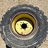 Pair of 300/70R16.5 tires on Jd 6 bolt wheels