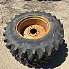 Pair of 13.6 24 tires on case 8 bolt wheels