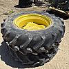 Pair of unused Firestone 420/85R34 tires on Jd 8 bolt wheels