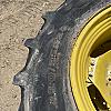 Pair of unused Firestone 420/85R34 tires on Jd 8 bolt wheels