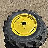 Pair of unused Mitas 320/70R24 tires on Jd 6 bolt wheels