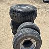 Set of 4 tires and wheels off case jx1075 4x4 turfs