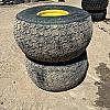 Pair of 22.5 L x16.1 turf tires on John Deere 8 bolts wheels