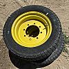 Pair of 12Ll-16 turf tires on John Deere 8 bolt wheels