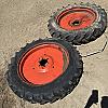Pair of 9.5 R32 tires on Kubota 6 bolt wheels