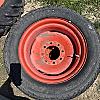 Pair of 12L -16 turf tires on Kubota 8 bolt wheels