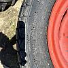Pair of 12L -16 turf tires on Kubota 8 bolt wheels