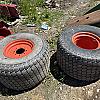 Pair of 610R470 turf tires on Kubota 8 bolt wheels