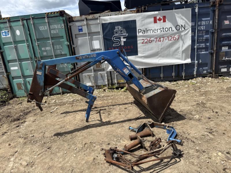 2012 New Holland 7308 loader with brackets and bucket