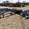 2012 New Holland 17LA loader with bucket brackets and valve