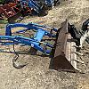 2012 New Holland 16LA loader with bucket and brackets
