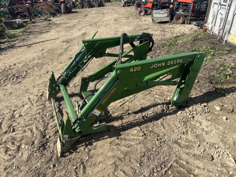 2012 John Deere 420 loader with brackets
