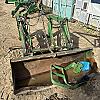 2012 John Deere 430 loader with buckets and brackets