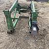 2012 John Deere loader with brackets and a valve