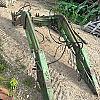 2012 John Deere 245 loader with brackets and valve
