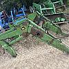 2012 John Deere 245 loader with brackets