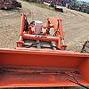 Kubota La1065 loader with bucket brackets and valve